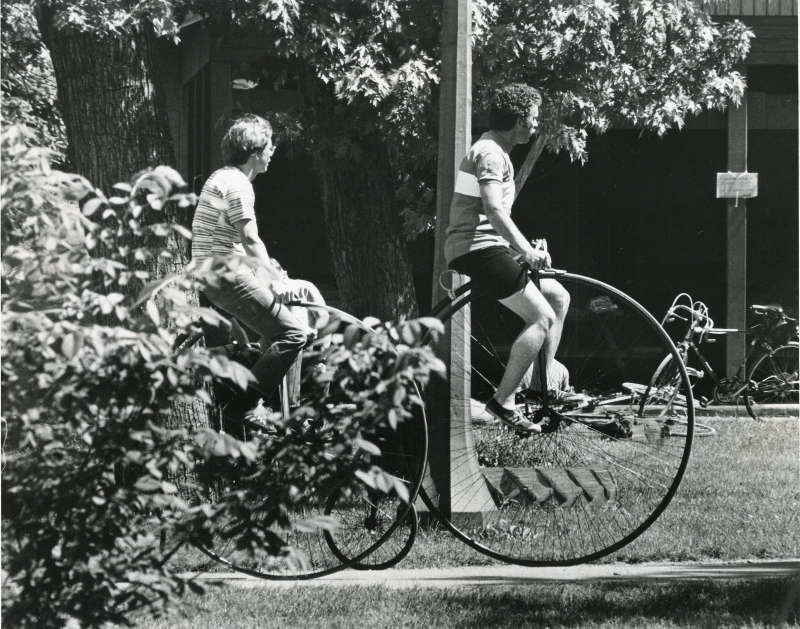 Two men on velocipedes in Letort Park