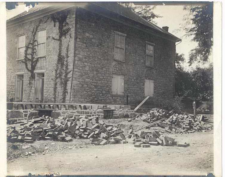 The window on the north side of the church, as seen from Chapel Alley, show alterations in the window