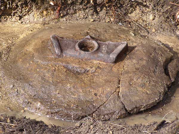 Image of a closeup of a relic gate post fixture.